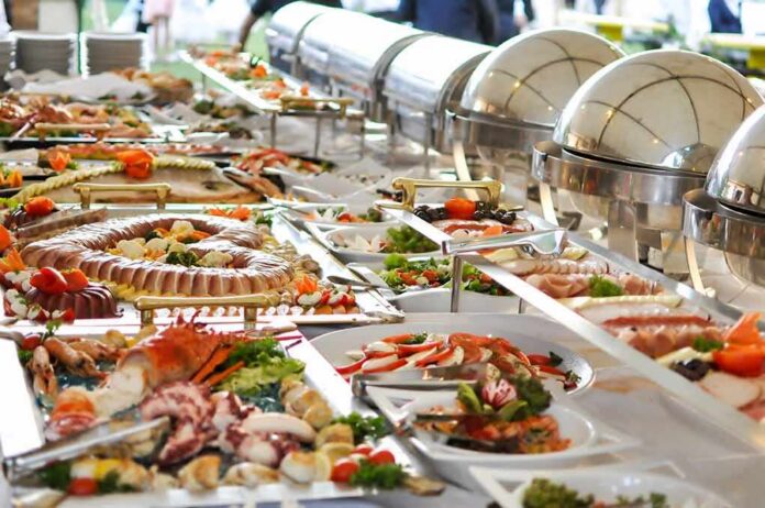 Buffet table with assorted seafood and salads