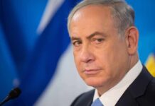 Netanyahu Blocks Trump Plan—Standoff Explodes man in suit at podium