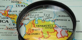 Venezuela Windfall Stalls—Deals Vanish Magnifying glass over a map of northern South America