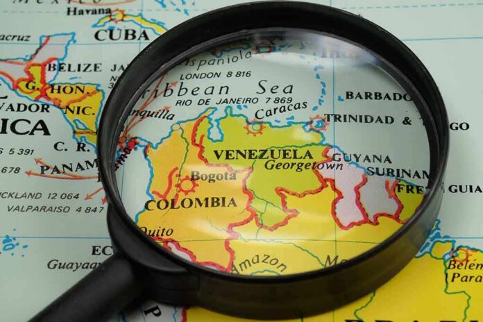 shutterstock_435064315 Magnifying glass over a map of northern South America
