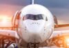 Packed Jet, High Pilot — What Was Inside? Front view of a commercial airplane on the tarmac