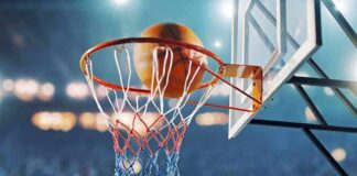 Target Center Silences Simple Shout-Out Basketball swishing through hoop in stadium