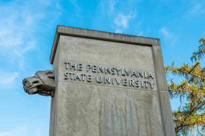 The Pennsylvania State University stone pillar with lion sculpture.