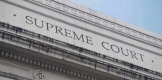 Watchdogs Corner Alito – Recusal Ripple Hits Big Climate Fight Supreme Court building facade with classical columns