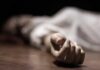 hand of a person lying on the floor