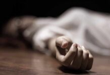 hand of a person lying on the floor