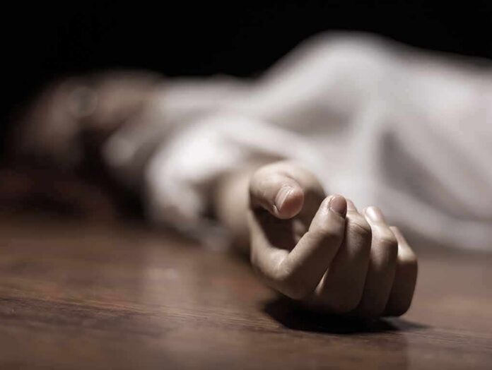 hand of a person lying on the floor