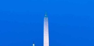 Washington Monument with Lincoln Memorial and Capitol at dusk