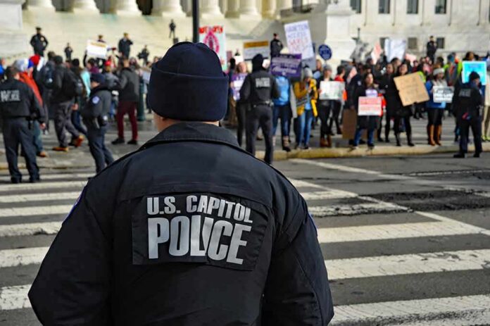 Police officer monitoring a protest on a city street