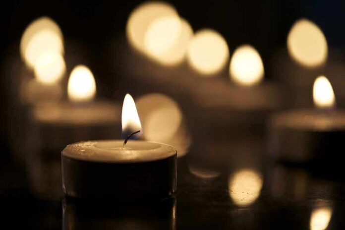 Tealight candle with soft glowing flame