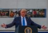 Press Ban Fallout: TRUMP TV Goes 24/7 Donald Trump speaks at a podium with arms outstretched
