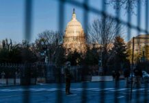 Midday Chaos – Driver Demands Trump Meeting U.S. Capitol behind security fencing and guards on a street