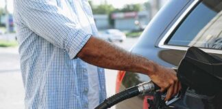 Pump Pain Wrecks Campaign Playbooks Person refueling a car at a gas pump