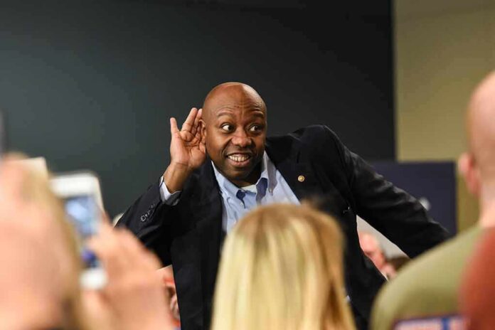 Tim Scott cupping his ear while interacting with a crowd