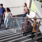 Students walking on a school staircase