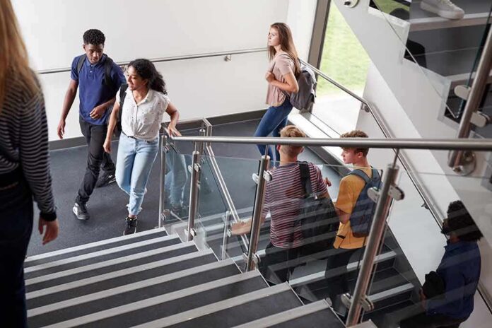 Students walking on a school staircase