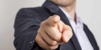 hand pointing directly at the camera