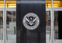 Pay-To-Play Storm Brews at Homeland Security U.S. Department of Homeland Security emblem on building entrance