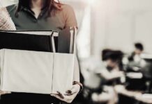 Obama Judge Slaps DOJ – Stunning Reversal Person carrying a box of office items