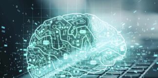 digital brain hologram over a laptop keyboard