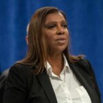 woman speaking at a press conference