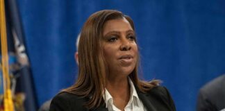 woman speaking at a press conference