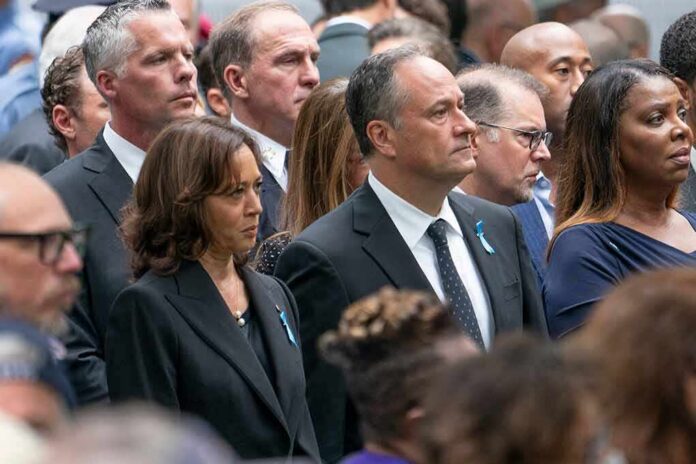 shutterstock_2203919303 Group of people standing at a solemn ceremony
