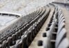 Empty stadium seats in curved rows