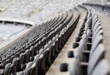 Free Speech Fight – Fans Dragged Out Over A Slogan? Empty stadium seats in curved rows