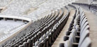 Free Speech Fight – Fans Dragged Out Over A Slogan? Empty stadium seats in curved rows