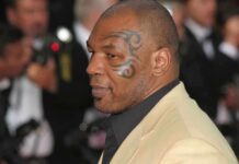 Mike Tyson in profile at an event