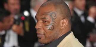 Mike Tyson in profile at an event
