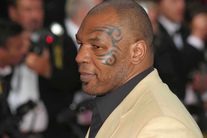 Mike Tyson in profile at an event