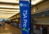 TSA PreCheck sign in an empty airport check-in area