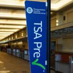 TSA PreCheck sign in an empty airport check-in area