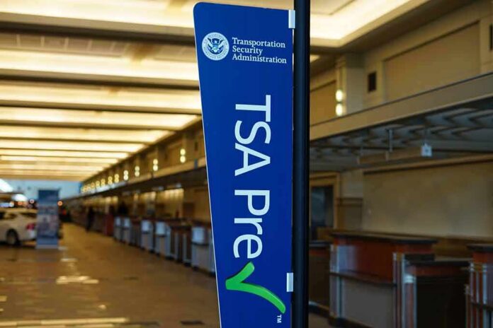 TSA PreCheck sign in an empty airport check-in area